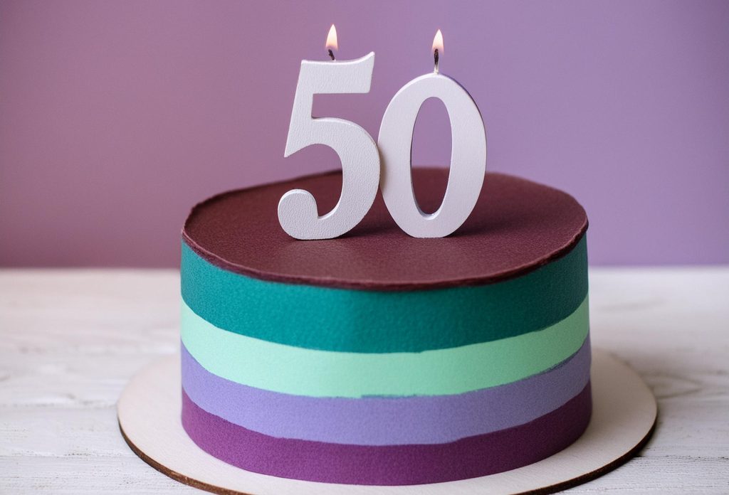 taart in kleuren paars en groen met daarop het cijfer 50
