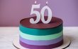 taart in kleuren paars en groen met daarop het cijfer 50