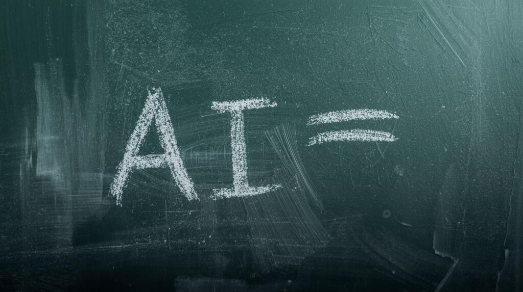 Schoolbord met daarop in krijtletters AI =